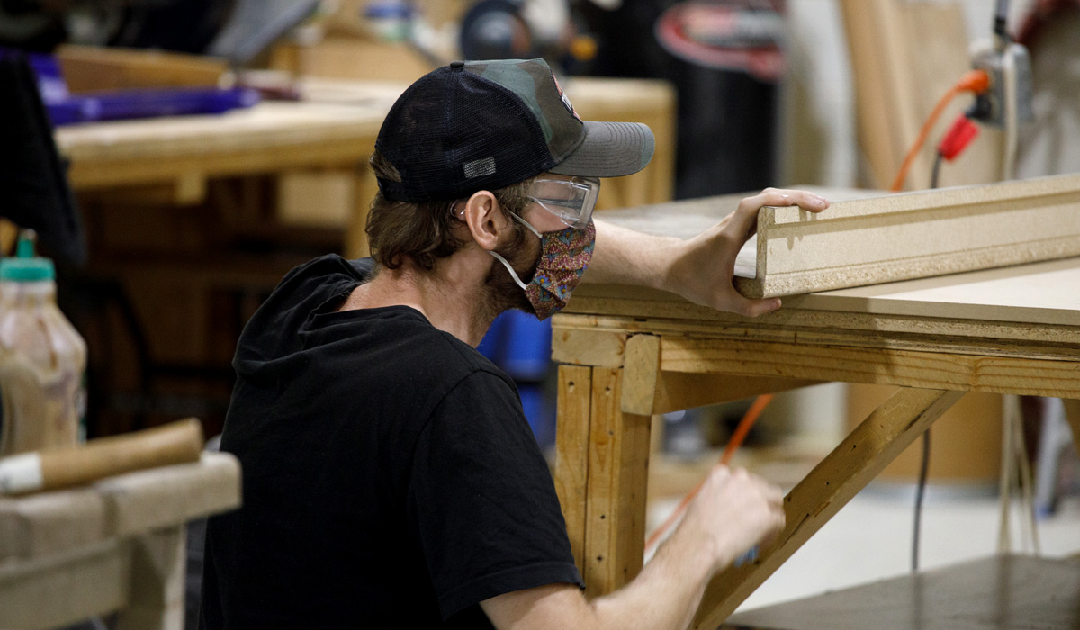 Youth working in the wood shop