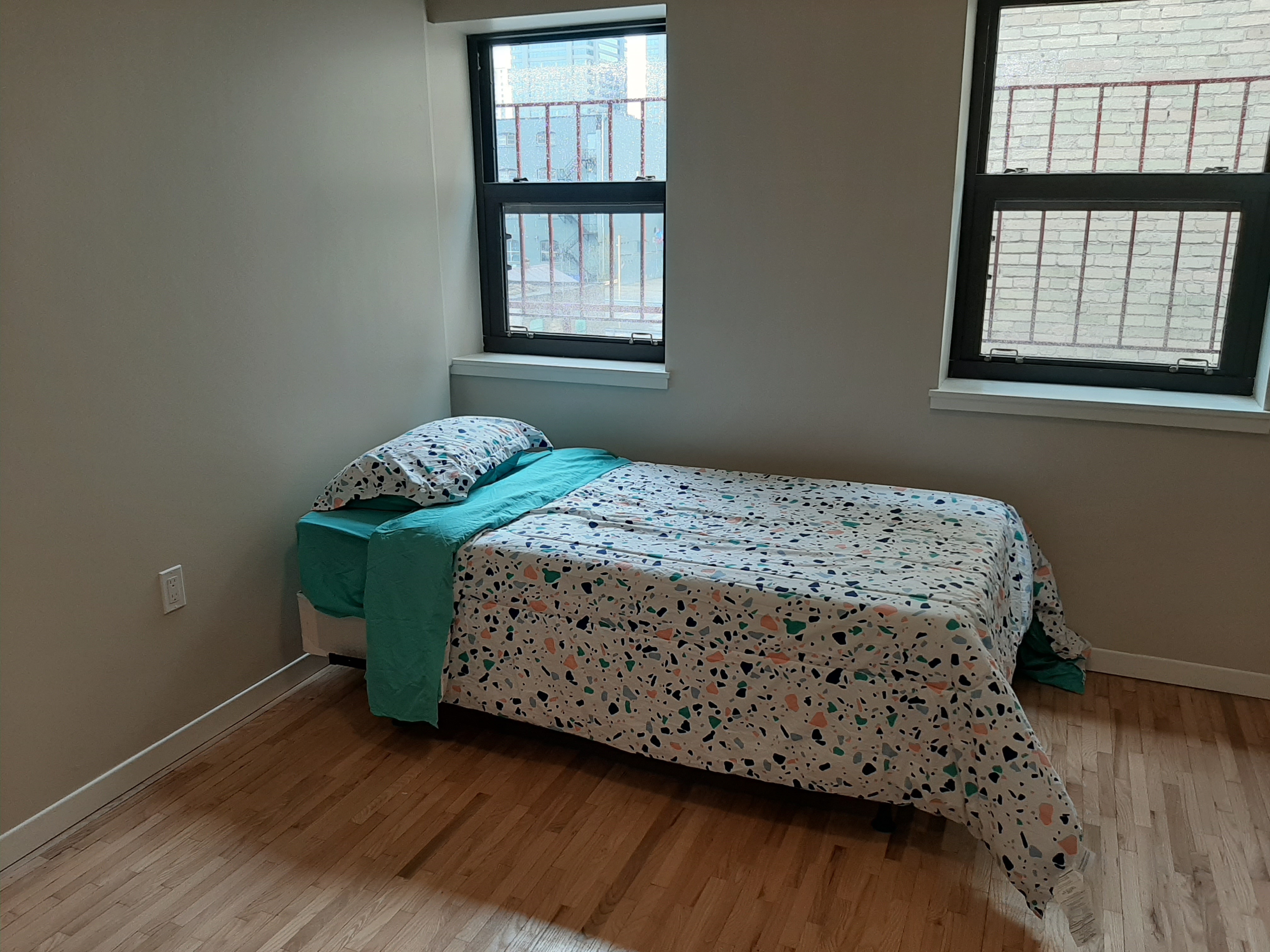 Another safe bed with natural light at 340 Richmond St. 